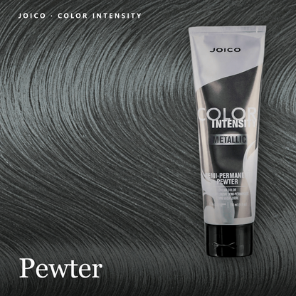 A squeeze tube of Joico Color Intensity Metallic Semi-Permanent Powder in the shade 'Pewter' is displayed against a background of dark, highlighted hair showing the color result.