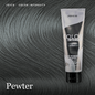 A squeeze tube of Joico Color Intensity Metallic Semi-Permanent Powder in the shade 'Pewter' is displayed against a background of dark, highlighted hair showing the color result.