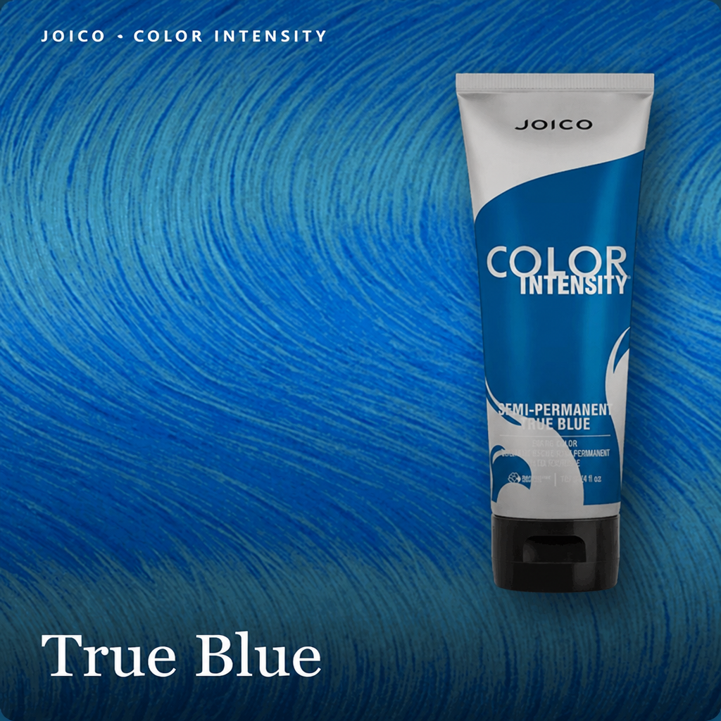A tube of Joico Color Intensity Semi-Permanent Blue Blue hair dye stands against a textured blue background with text reading 'True Blue' 